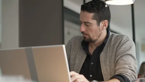 Businessman at work using smartphone and laptop Stock Footage 121456952