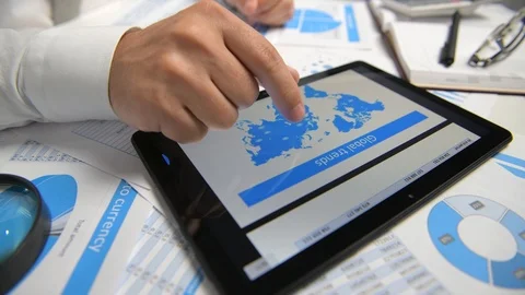Businessman working and calculating, Using tablet pc Stock Footage 117469442