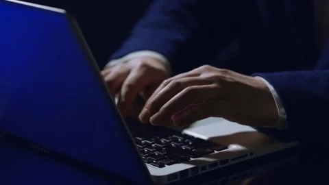 Businessman working and typing on a laptop Stock Footage 274334331