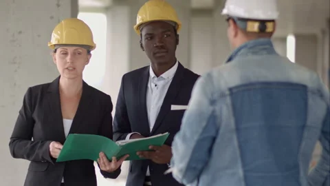 Businessman working with Architect Engineer in building Construction Site with Stock-Footage 117136353