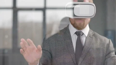 Businessman working in augmented reality glasses Stock Footage