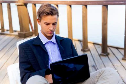 Businessman working on a beach Stock Photos