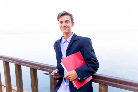 Businessman working on a beach Stock Photos