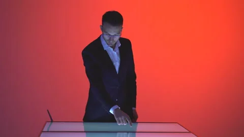 The businessman working with a big display Stock Footage 100563112