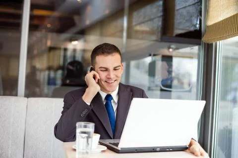 Businessman working in cafe Stock Photos