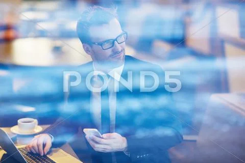Businessman working in cafe Stock Photos