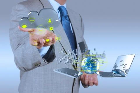 Businessman working with a cloud computing diagram on the new computer interf Ilustración de archivo