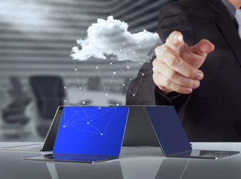 Businessman working with a cloud computing diagram on the new computer interf 스톡 일러스트