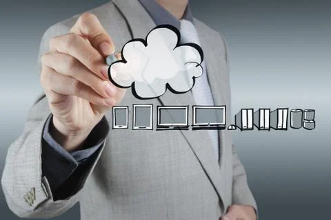 Businessman working with a cloud computing diagram on the new computer interf Illustrazione stock