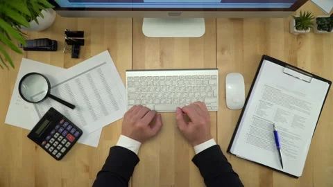 Businessman Working On Computer And Signing Document Flat Lay Stock Footage 137098068