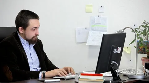 Businessman Working on the Computer in the Office Stock Footage 47977640