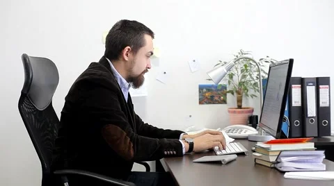 Businessman Working on the Computer in the Office Stock Footage 47977666