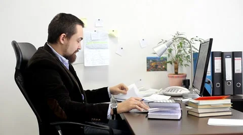 Businessman Working on the Computer in the Office Stock Footage 47977703