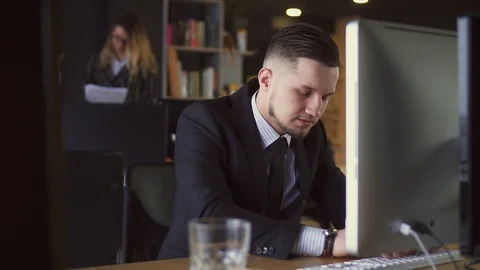 Businessman Working at Computer in Office Stock Footage 107346766