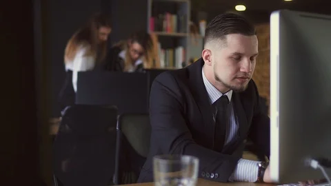 Businessman Working at Computer in Office Stock Footage 107346798
