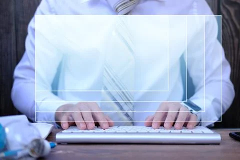 Businessman working on computer in office typing keyboard Stock Photos