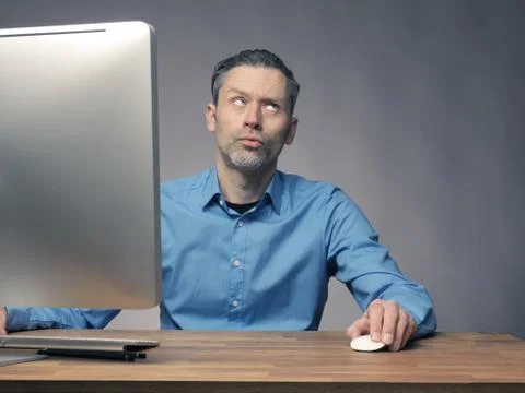 Businessman working with a computer Stock Photos