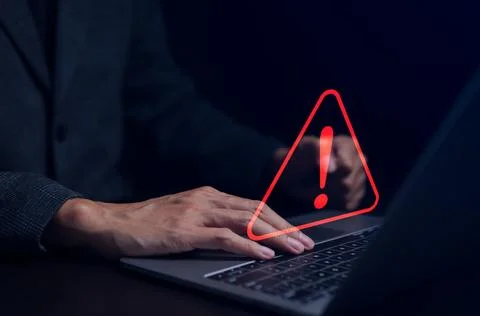 Businessman working on the computer. Warning alert system concept, Stock Photos