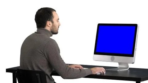 Businessman working with a computer, white background. Blue Screen Mock-up Stock Photos