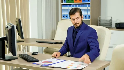 Businessman working concentrated with his computer Stock Footage 83762073