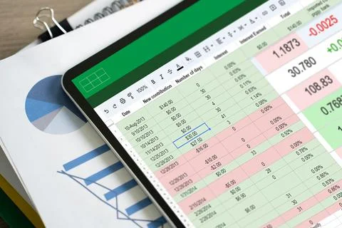 Businessman working with data and graphs in spreadsheet documents for onlin.. Stock Photos