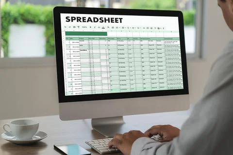 Businessman working with data and graphs in spreadsheet documents for onlin.. Stock Photos