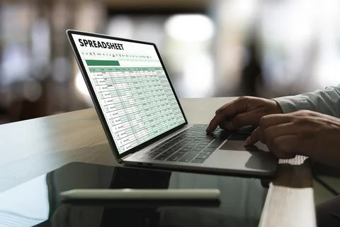 Businessman working with data and graphs in spreadsheet documents for onlin.. Stock Photos