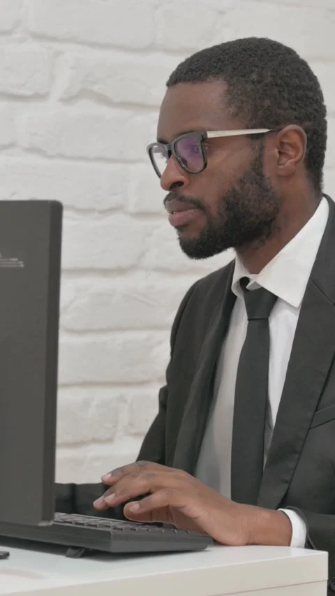 Businessman Working on a Desktop Computer Stock Footage 317998990