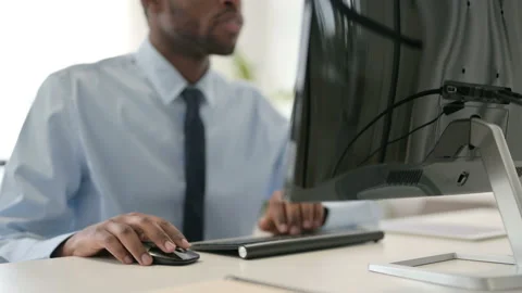 Businessman Working on Desktop Using Mouse and Keyboard Stock Footage 146484241