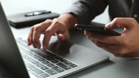 Businessman working with devices Stock-Footage 160482976