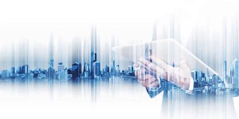 Businessman working on digital tablet with double exposure city Stock Photos