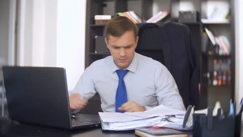 Businessman working with documents Stock Footage 88418973