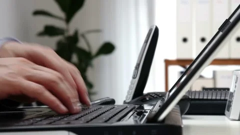 Businessman working with documents in an office - 4k Stock Footage 71336132