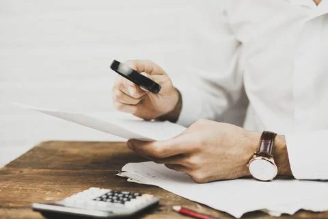 Businessman working in  documents Stock Photos