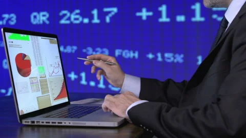 Businessman working on finance data Stock Footage 210564557