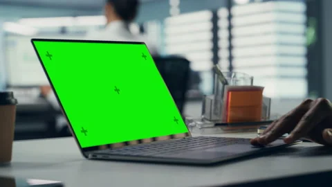 Businessman Working on Green Screen Computer in Office Stock Footage 162054024