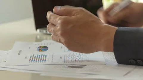 Businessman working with laptop and using smart phone, closedup Stock Footage 98561667