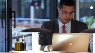 Businessman Working With Laptop In Cafe Stock Footage