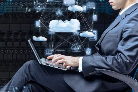 Businessman working with laptop in cloud computing concept Stock Photos