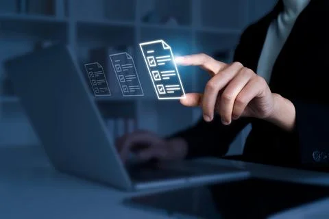 Businessman working on laptop computer with electronics document, E-document Stock Photos