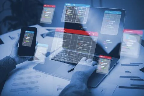 Businessman working on laptop computer with a server room, data center, big d Stock Photos