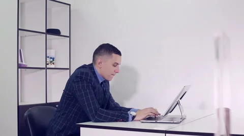 A businessman working with a laptop Stock Footage 66577499