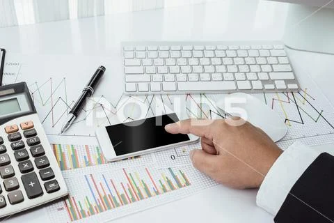 Businessman working with modern devices, computer and mobile phone Stock Photos