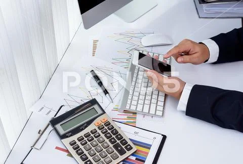 Businessman working with modern devices, computer and mobile phone Stock Photos