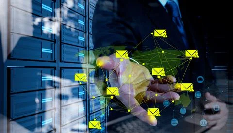 Businessman working with the new computer interface sending email 库存照片