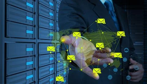 Businessman working with the new computer interface sending email 库存照片