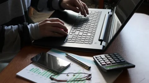 Businessman working in office at a computer Stock Footage 67548266