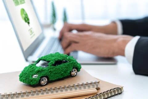 Businessman working in office developing plan on ev car. Gyre Stock Photos