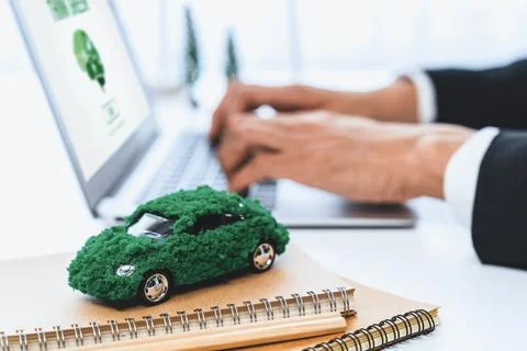 Businessman working in office developing plan on ev car. Gyre Stock Photos