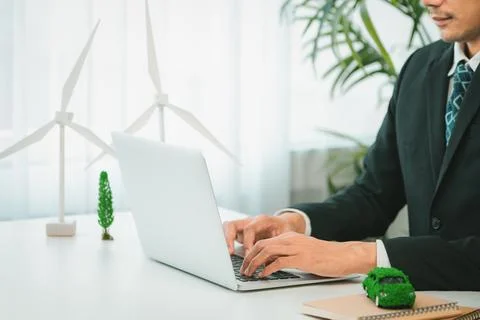 Businessman working in office developing plan on ev car. Gyre Stock Photos